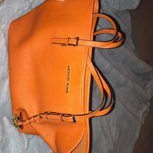Beautiful bright orange Michael Kors bag